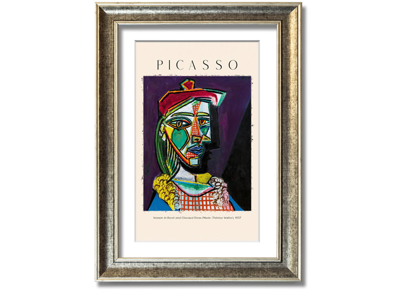 A vibrant reproduction of Picasso's 'Woman In Beret And Checked Dress 1937' printed on canvas, framed and ready to hang.